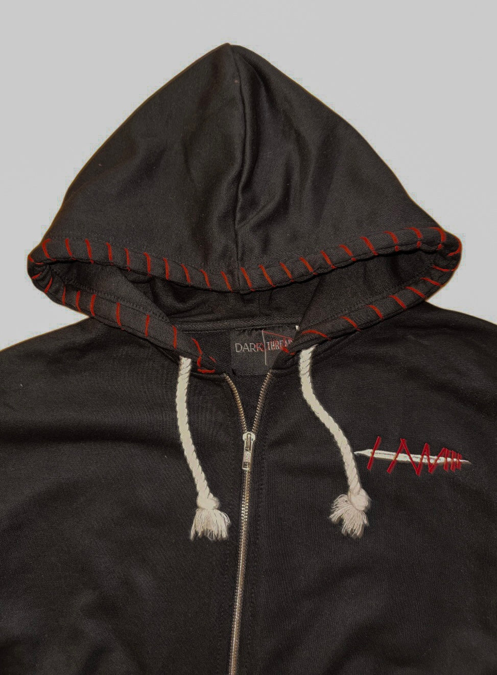 Black thread zip up